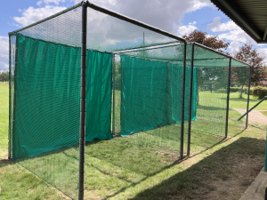 Outdoor cricket practice nets on sports field