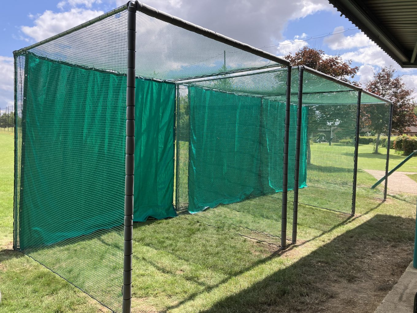 Outdoor cricket practice nets on sports field